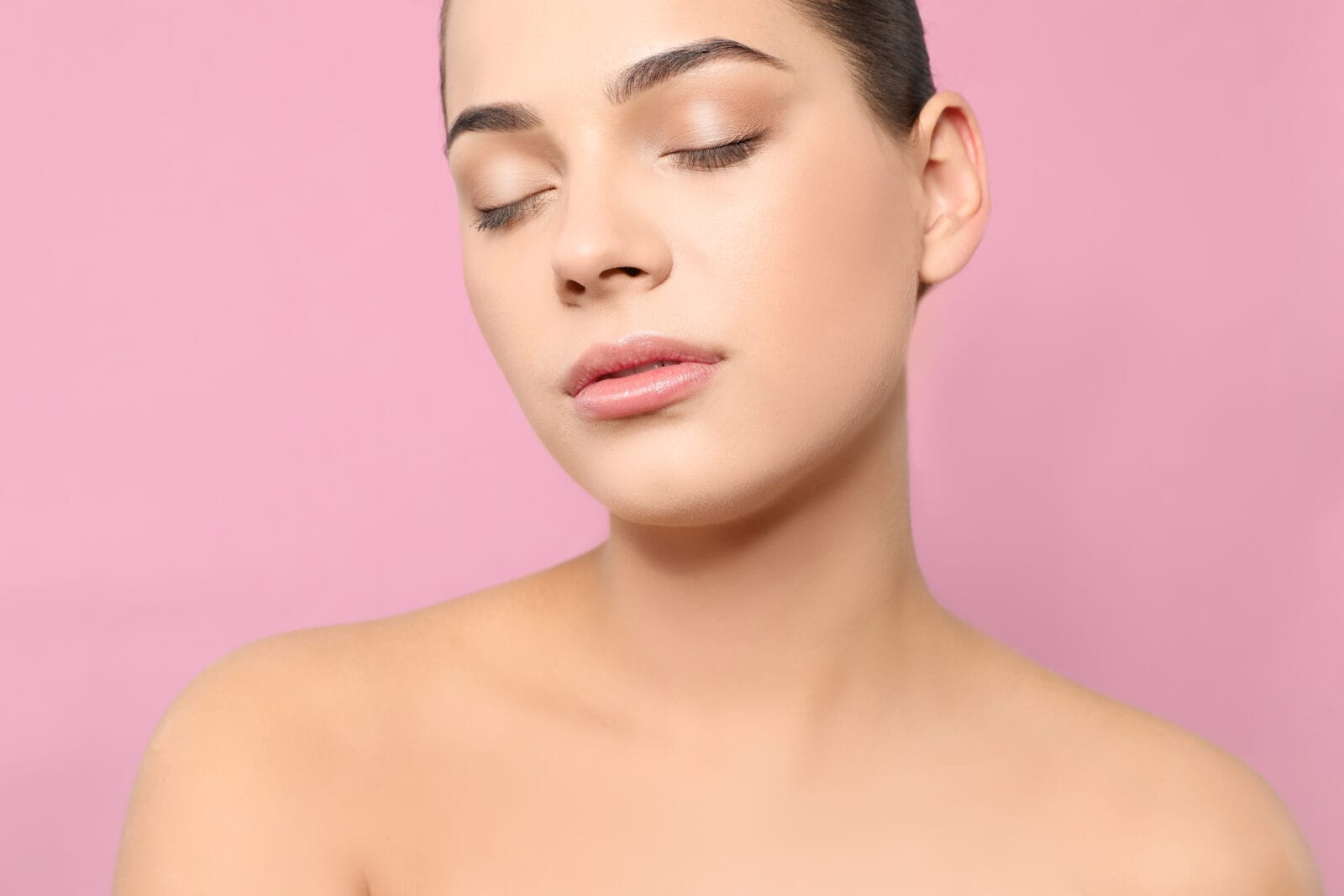 young woman with glowing skin